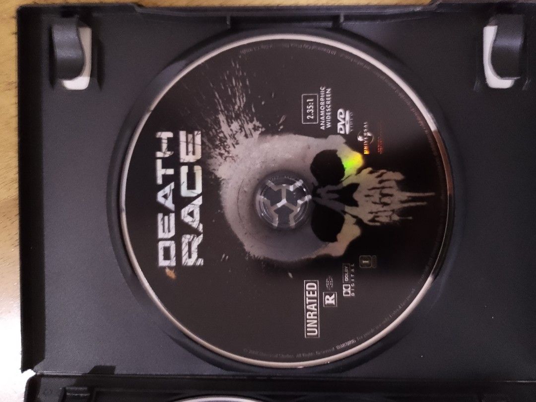 Death Race Unrated DVD (Category: CDs & DVDs) located in Pasig City. Submitted by joeysden (Listing ID 1464184410, Image 3). Description: - Death Race (Unrated Version) - Includes both theatrical and unrated cuts - High-octane action with Jason Statham, Tyrese Gibson, Ian McShane, and Joan Allen - Special features: Behind-the-wheel dissections, making of the movie.