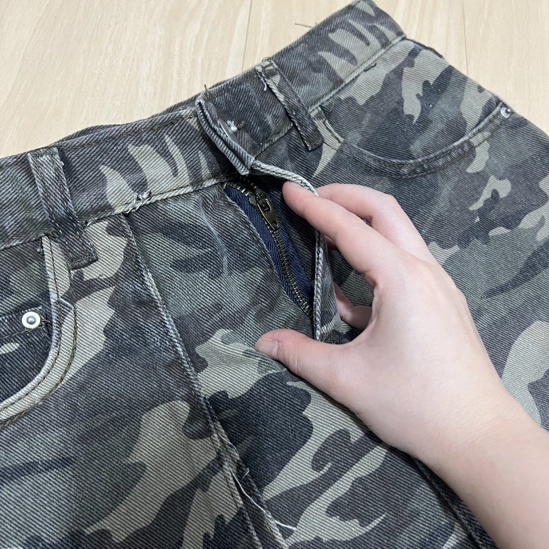 Denim Camo/ Camouflage Mini Skirt (Category: Skirts) located in Las Pinas. Submitted by obsessorizeph (Listing ID 1464198469, Image 2). Description: Denim Camo Skirt Color — Camo / Green Size — Waist 27-28” | Length 14” | Hips 36” Location — Pulang Lupa Uno, Las Piñas City, Metro Manila Mode of Payment — GCash, BDO or BPI ₱500.