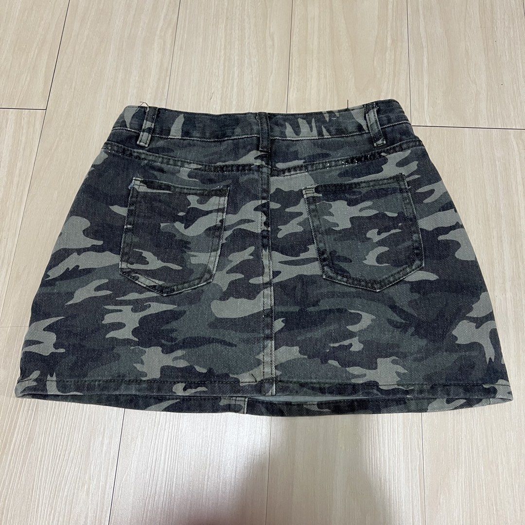 Denim Camo/ Camouflage Mini Skirt (Category: Skirts) located in Las Pinas. Submitted by obsessorizeph (Listing ID 1464198469, Image 3). Description: Denim Camo Skirt Color — Camo / Green Size — Waist 27-28” | Length 14” | Hips 36” Location — Pulang Lupa Uno, Las Piñas City, Metro Manila Mode of Payment — GCash, BDO or BPI ₱500.