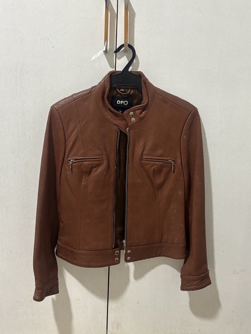 DFO Brown Leather Biker Jacket Size Small (Category: Coats, Jackets and Outerwear) located in Quezon City. Submitted by ricalazo (Listing ID 1464189859, Image 1). Description: - Genuine brown leather biker jacket from DFO - Zip-up front closure - Two zippered chest pockets - Snap button detail on collar - Brand New. Never Used. Tinago lang kaya nag start na mag chip yung leather. .