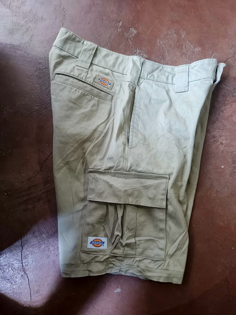 Dickies Cargo Shorts Khaki (Category: Shorts) located in Gumaca. Submitted by makuliti (Listing ID 1464180464, Image 1). Description: - Classic Khaki Dickies cargo shorts - Timeless workwear style - Multiple functional pockets for ample storage - Made with durable fabric for long-lasting wear - Ideal for everyday casual wear or demanding work environments.