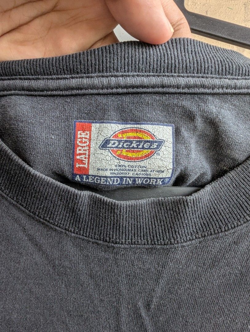 Dickies Single Pocket Workwear T-Shirt (Category: Tshirts & Polo Shirts ) located in Quezon City. Submitted by ragpicker (Listing ID 1464160807, Image 3). Description: Made in Honduras Overall: good vintage workwear condition. Fabric/Color: Evenly washed-out faded black with nice character. No holes or severe tears observed. 250+sf.