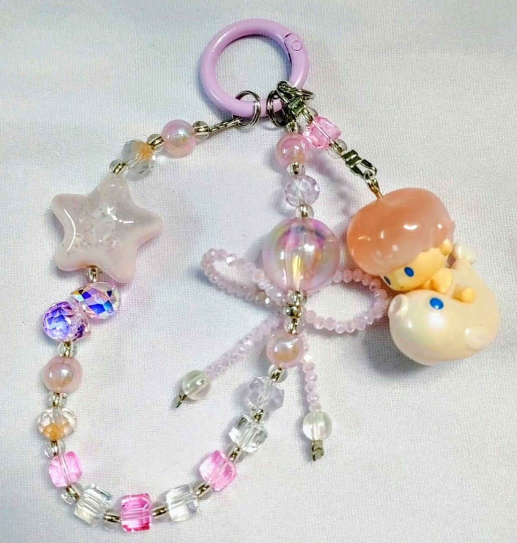 Dimoo peach authentic popmart popbeans DIY charms (Category: Charms) located in Caloocan City. Submitted by jark_moonshop (Listing ID 1464279150, Image 1). Description: authentic popmart popbeans DIY charms with marking. gift pouch and transparent blank tag is available with extra fee of 10pesos per set of pouch and blank tag for tag price can do lalamove or JNT .