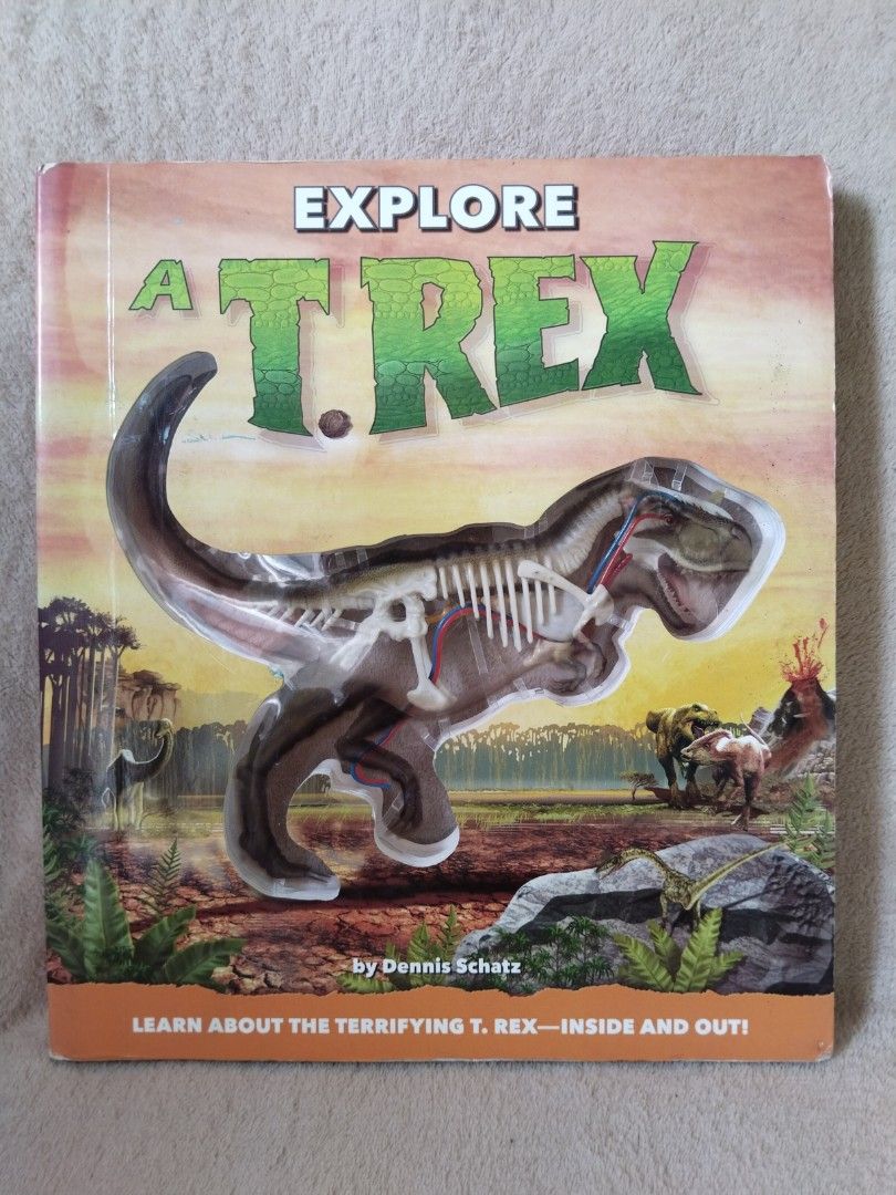 Dinosaur: Explore a T-Rex Interactive 3D Anatomy Book by Dennis Schatz (Category: Children's Books) located in Cavite. Submitted by munting_aklatan_ph (Listing ID 1464224957, Image 2). Description: - Interactive T-Rex book with pop-ups and cutaways - Discover the dinosaur's anatomy - Learn how T-Rex moved and used its arms - Explore if T-Rex was warm or cold-blooded - Fun and educational for young dinosaur enthusiasts.