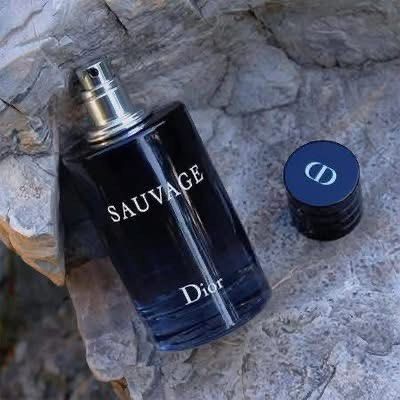 Dior Sauvage Eau de Parfum for Men (Category: Fragrance & Deodorants) located in Malabon City. Submitted by tinxoxo (Listing ID 1464329176, Image 1). Description: - Dior Sauvage Eau de Parfum - Features a dark blue glass bottle with silver accents - Includes the original cap - Versatile scent suitable for daily wear or special events.