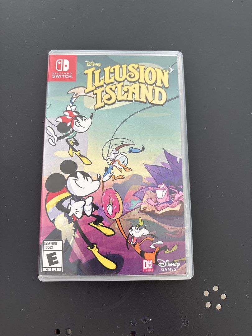 Disney Illusion Island Nintendo Switch Game (Category: Nintendo) located in Quezon City. Submitted by mynameismio (Listing ID 1464160284, Image 1). Description: - Disney Illusion Island for Nintendo Switch - Join Mickey, Minnie, Donald, and Goofy on an adventure - Explore the vibrant world of Monoth - Perfect for all ages - ESRB Rating: E for Everyone.