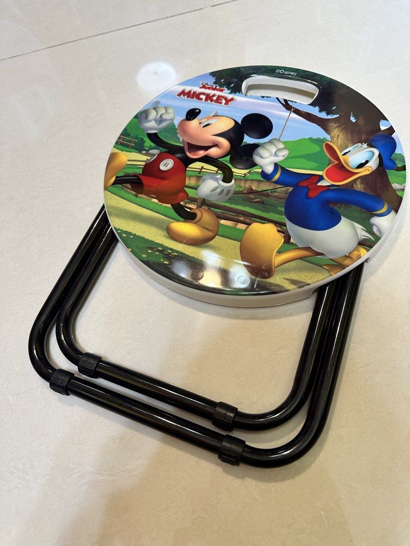 Disney Mickey Donald Duck Folding Stool (Category: Character Goods) located in Manila. Submitted by silver.truemountain (Listing ID 1464164241, Image 1). Description: - Adorable Disney stool featuring Mickey and Donald Duck. - Colorful graphic seat. - Folds flat for convenient storage. - Portable with a handle for easy carrying. - Ideal for kids' use or as a small accent seat. - Perfect for picnics, indoor, or outdoor use..