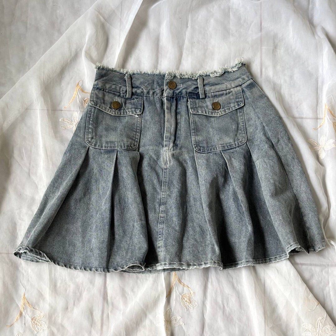 Distressed Hard Denim Pleated Mini Skirt (Category: Skirts) located in Manila. Submitted by petalfinds_ (Listing ID 1464238757, Image 1). Description: ᥫ᭡.ִֶָ𓂃 washed denim pleated flowy skirt ౨ৎ 𝐛𝐫𝐚𝐧𝐝: ౨ৎ 𝐬𝐢𝐳𝐞: 25-26 wl, 15" length 🫧⋆｡˚ 𝐝𝐞𝐭𝐚𝐢𝐥𝐬: tattered waist, with pockets and buttons design, with inner shorts, pleated, hard denim! no issue ─── ⋆⋅☆⋅⋆ ── 𝖒𝖎𝖓𝖊 (𝖆𝖚𝖙𝖔 𝖞𝖔𝖚𝖗𝖘): 159.