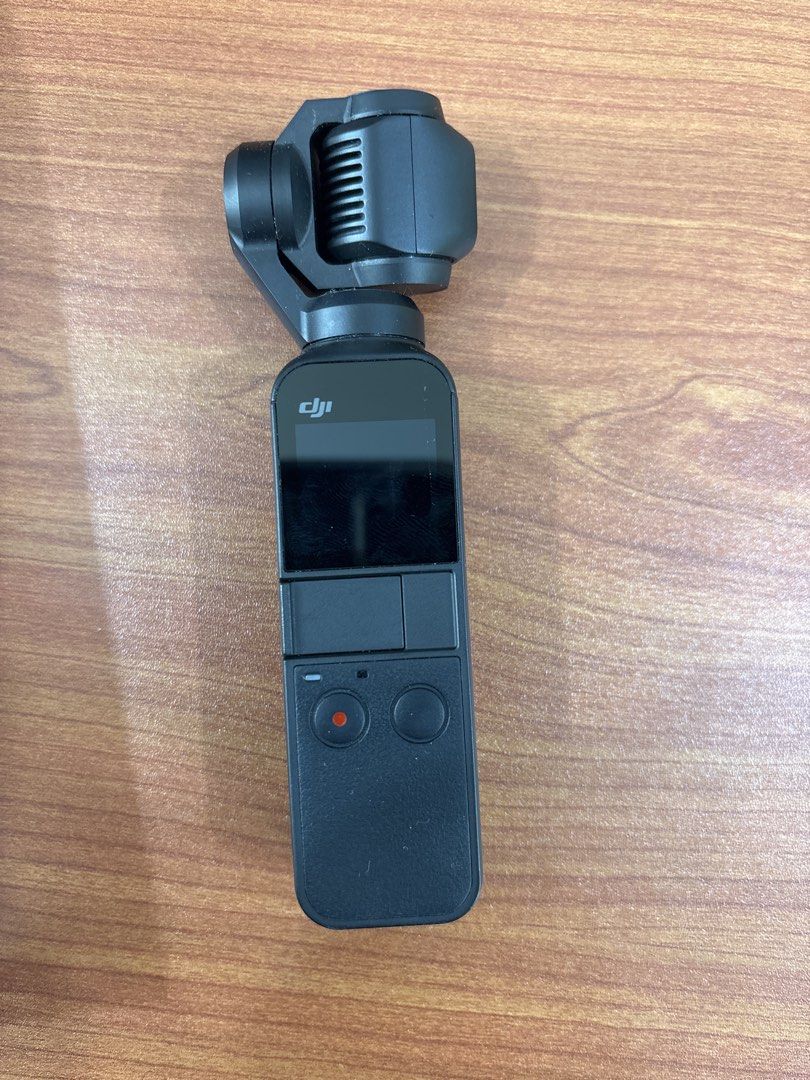 DJI Osmo Pocket Gimbal Camera (Category: Cameras) located in Quezon City. Submitted by mynameismio (Listing ID 1464158930, Image 2). Description: - Capture smooth, stabilized video on the go with the DJI Osmo Pocket. - Includes original protective case and box. - Features a small, intuitive screen and simple controls for easy operation. - Ultra-compact and portable design, perfect for travel and everyday adventures..