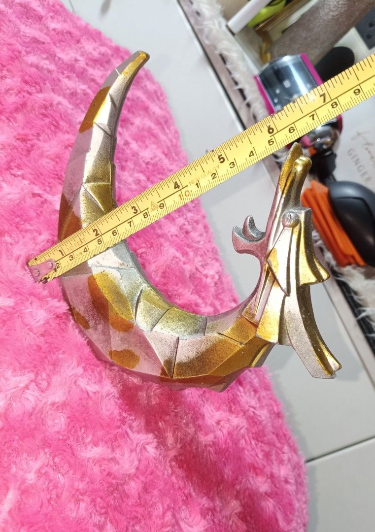 Dragon Crescent Moon Figurine Sculpture Decor (Category: Figurines & Statues) located in Pasay City. Submitted by ynamariie (Listing ID 1464204733, Image 3). Description: - Unique Dragon Crescent Moon Sculpture - Metallic Silver and Gold Finish - Geometric, Faceted Design - Perfect for Display or Desk Ornament - Approximately 7 Inches Long.
