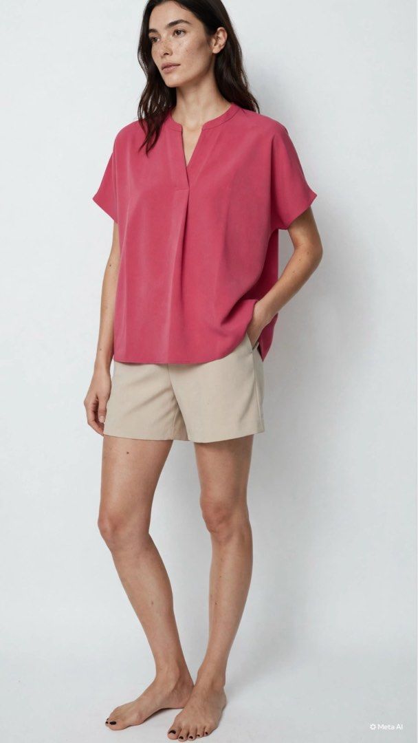 “Drape short-sleeve blouse with a V-slit / split neckline (Category: Blouses) located in Manila. Submitted by kgdecluttercloset (Listing ID 1464212775, Image 1). Description: .