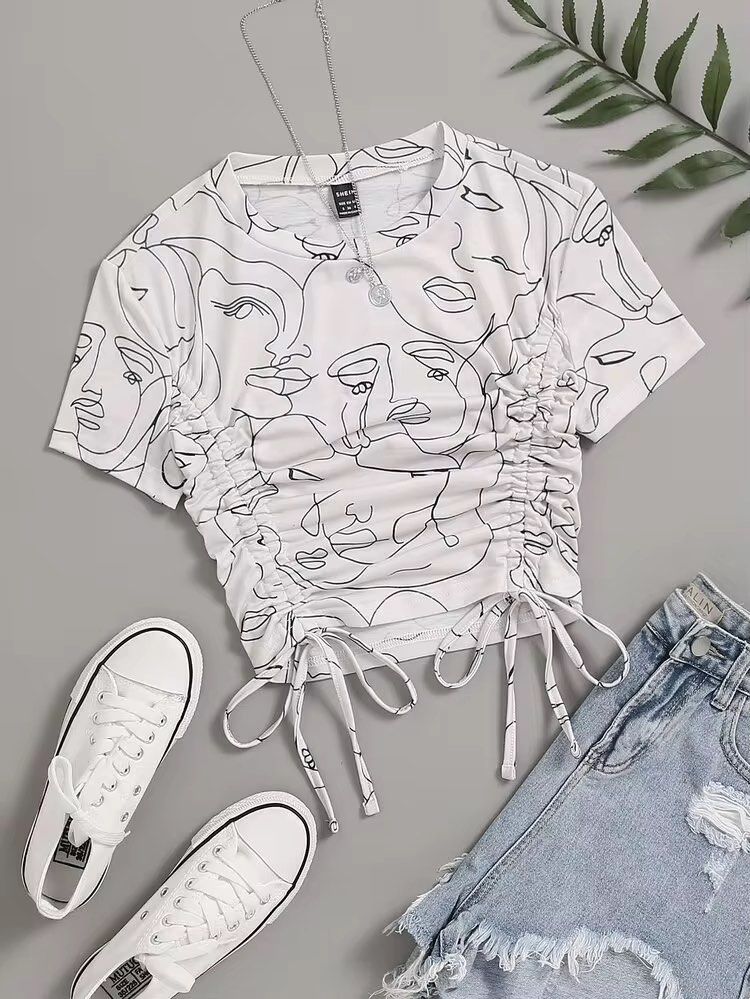 Drawstring Top (Category: Shirts) located in Singapore. Submitted by ayvnn (Listing ID 1464239685, Image 5). Description: - White graphic t-shirt - Unique abstract face print - Adjustable drawstring hem - Short sleeves - Crew neck - Ideal for casual wear - Pairs well with jeans or shorts ✅ +$2.50 for tracked mail via singpost OR buy with the ‘buy’ button for cheaper tracked mail ❌ no meetups/ self collect ❌ no additional photos ❌ no negos/ trades