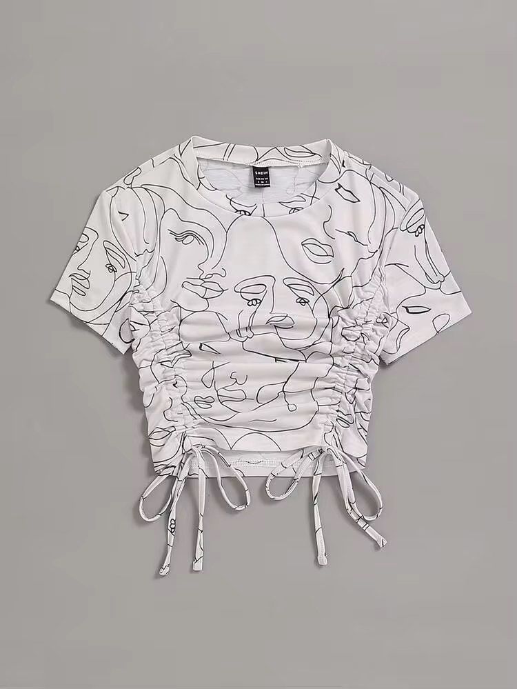 Drawstring Top (Category: Shirts) located in Singapore. Submitted by ayvnn (Listing ID 1464239685, Image 1). Description: - White graphic t-shirt - Unique abstract face print - Adjustable drawstring hem - Short sleeves - Crew neck - Ideal for casual wear - Pairs well with jeans or shorts ✅ +$2.50 for tracked mail via singpost OR buy with the ‘buy’ button for cheaper tracked mail ❌ no meetups/ self collect ❌ no additional photos ❌ no negos/ trades
