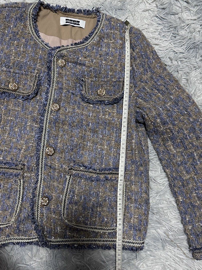 EENK Tweed Jacket with Embellished Buttons (Category: Coats, Jackets and Outerwear) located in Batangas. Submitted by kulilayfinds (Listing ID 1464221735, Image 3). Description: - EENK tweed jacket - Blue and brown checkered pattern - Embellished buttons on front and pockets - Frayed trim details - Estimated size: Medium - Perfect for dressing up or down - Lightweight tweed 😊 Best fits S to M EENK is a Korean brand..