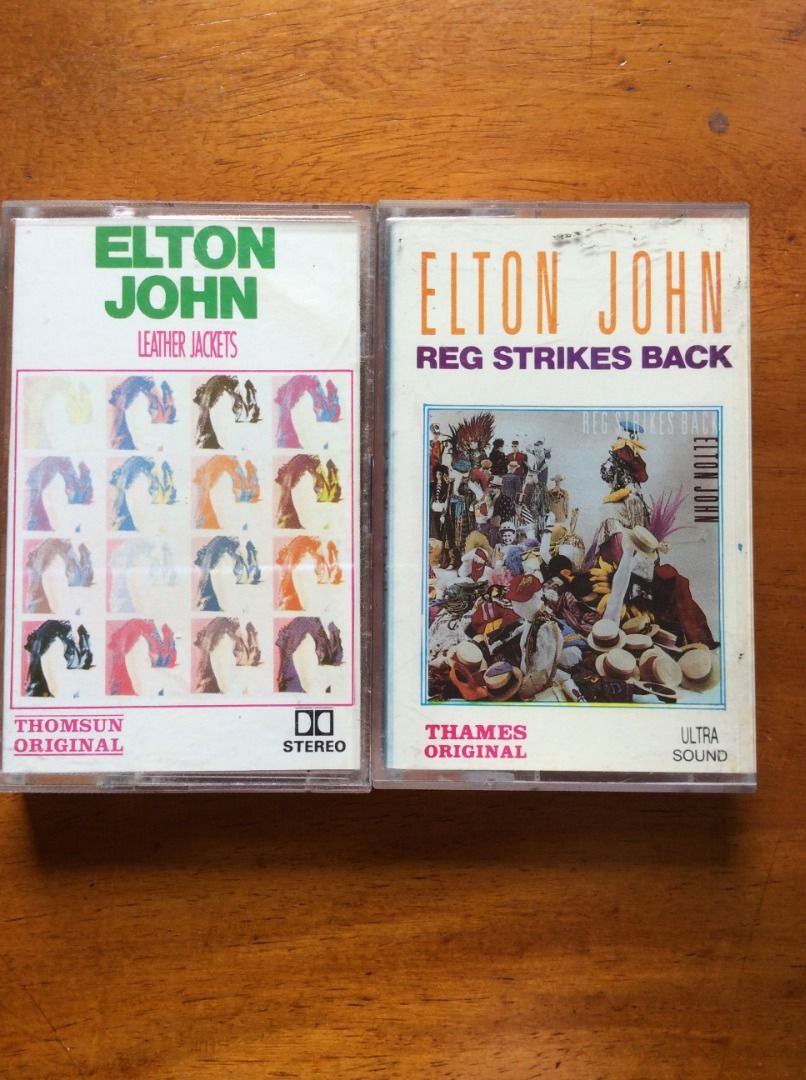 Elton John Cassette Tapes - Leather Jackets & Reg Strikes Back (Category: CDs & DVDs) located in Silang. Submitted by lawrencenorthey (Listing ID 1464175333, Image 1). Description: - Two original Elton John cassette tapes for sale. - 'Leather Jackets' (Thomsun Original, Dolby Stereo) - 'Reg Strikes Back' (Thames Original Ultra Sound) - Great additions for any Elton John fan's collection..
