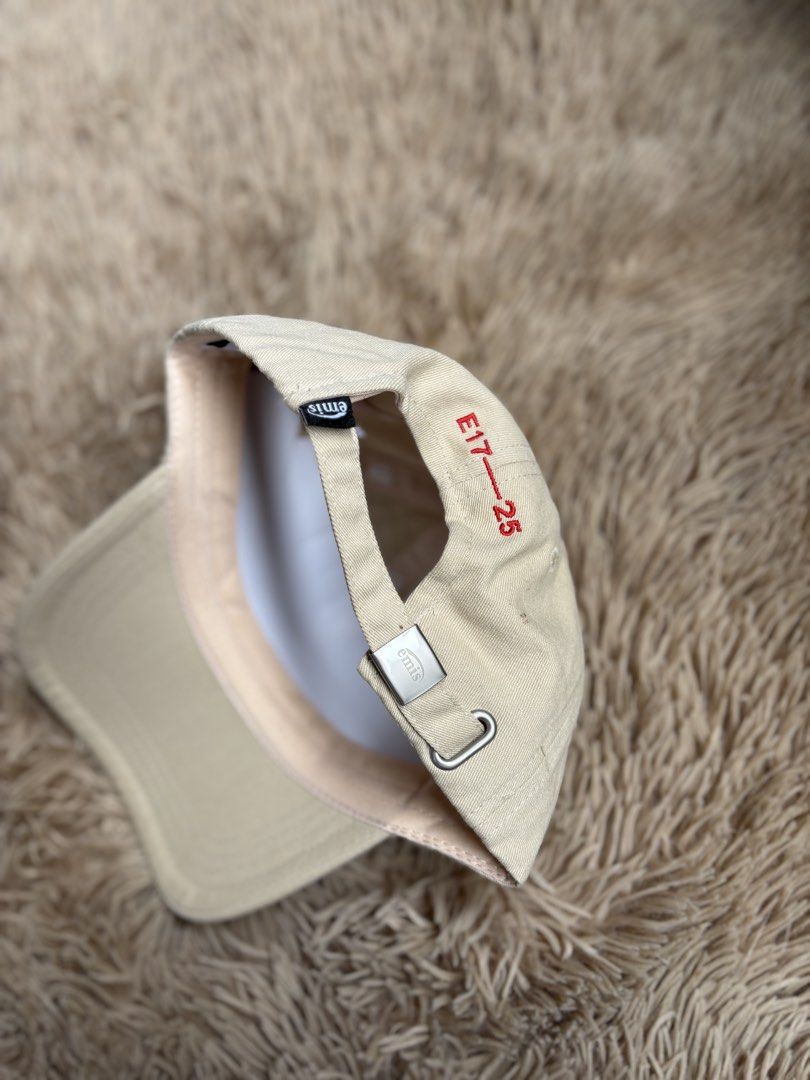 EMIS Heart Logo Baseball Cap Beige (Category: Caps & Hats) located in Quezon City. Submitted by nojthrift (Listing ID 1464252140, Image 3). Description: - Brand: EMIS - Color: Beige - Design: Classic baseball cap - Features: Embroidered red heart logo on front - Fit: Adjustable strap at the back - Style: Perfect for everyday wear.