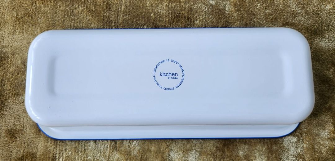 Enamel Rectangular Baking Tin (Category: Bakeware) located in Singapore. Submitted by openkit (Listing ID 1464146892, Image 3). Description: - Brand: Tchibo - Type: Rectangular baking tin - Material: Ovenproof metal enamel (corrosion-resistant) - Ideal for: Bread, terrines, loaf cakes, savoury & sweet dishes - Dimensions: Approx. 32cm (L) x 7cm (W) x 13cm (H) - Capacity: Approx. 1.9 Litres.