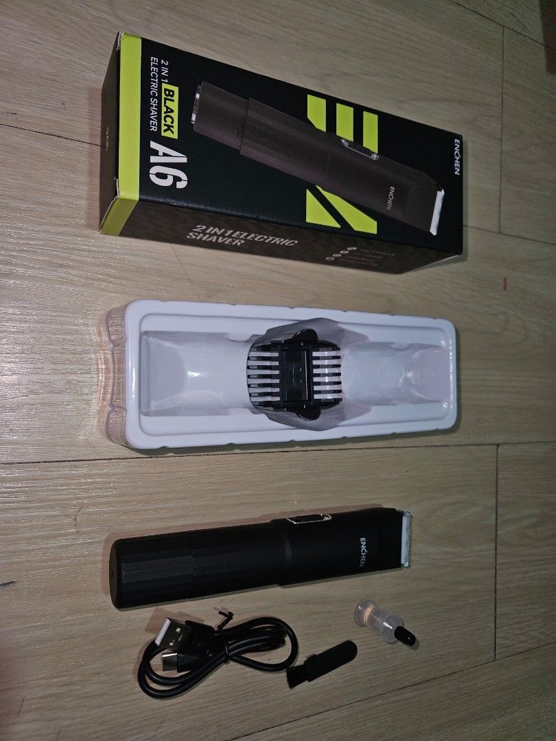 Enchen A6 2-in-1 Electric Shaver Black (Category: Men's Grooming) located in Taytay. Submitted by trialpile (Listing ID 1464183601, Image 2). Description: - Enchen A6 2-in-1 Electric Shaver - Color: Black - Includes: Original box, charging cable, cleaning brush, and oil - Ideal for travel and everyday grooming - User-friendly operation and charging - RFS: Bought the wrong item.