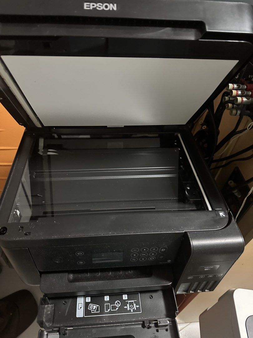 Epson printer (Category: Printers, Scanners & Copiers) located in Singapore. Submitted by jackiza143 (Listing ID 1464172821, Image 2). Description: All working fine except printer I think the printer head clogged need to fixed as long you how to fixed can use this I also hv balance ink I give you free .