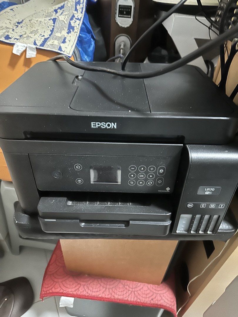 Epson printer (Category: Printers, Scanners & Copiers) located in Singapore. Submitted by jackiza143 (Listing ID 1464172821, Image 1). Description: All working fine except printer I think the printer head clogged need to fixed as long you how to fixed can use this I also hv balance ink I give you free .