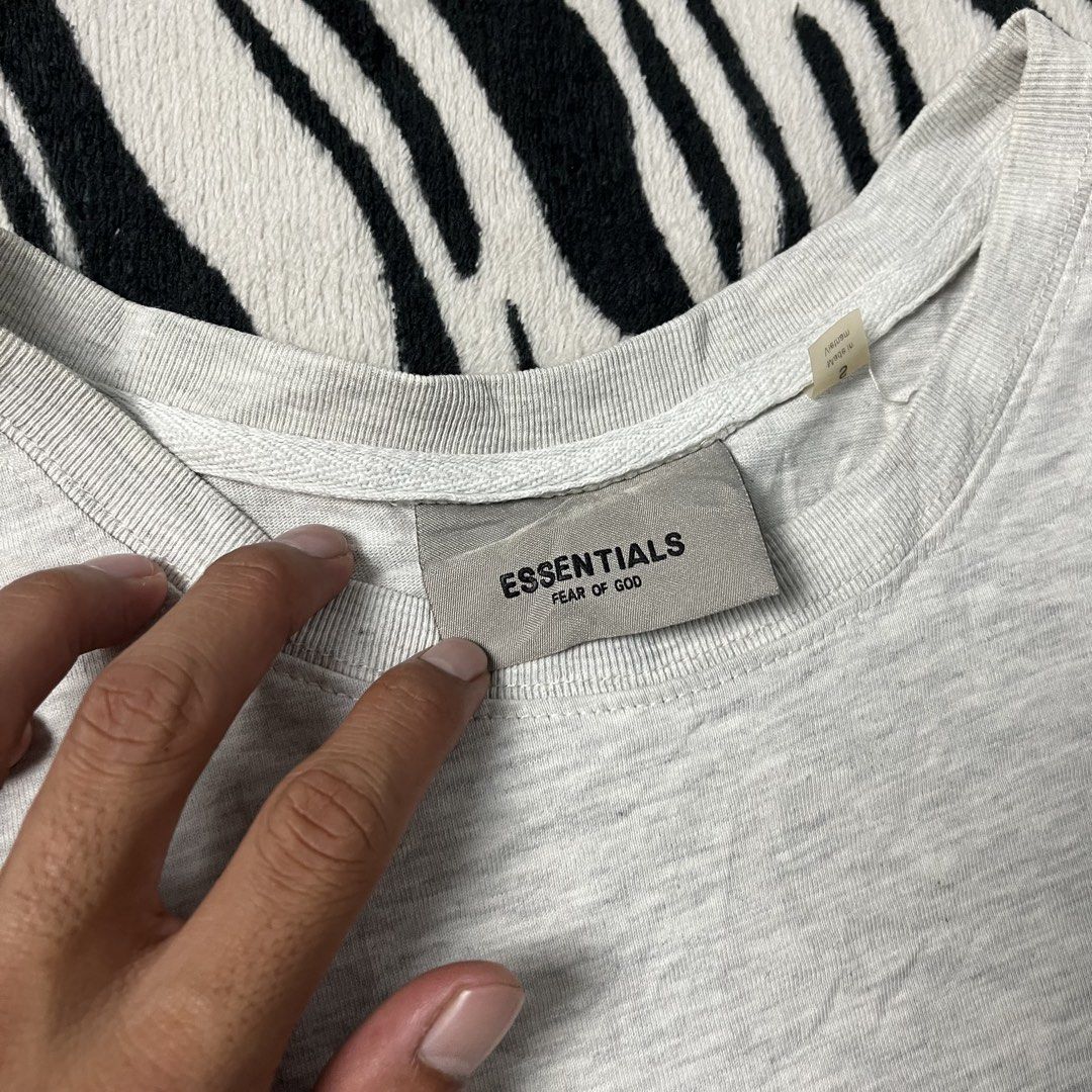 Essentials script tshirt (Category: Tshirts & Polo Shirts ) located in Manila. Submitted by royaldripmanila (Listing ID 1464277767, Image 3). Description: Sign of usage W22 L29.5.