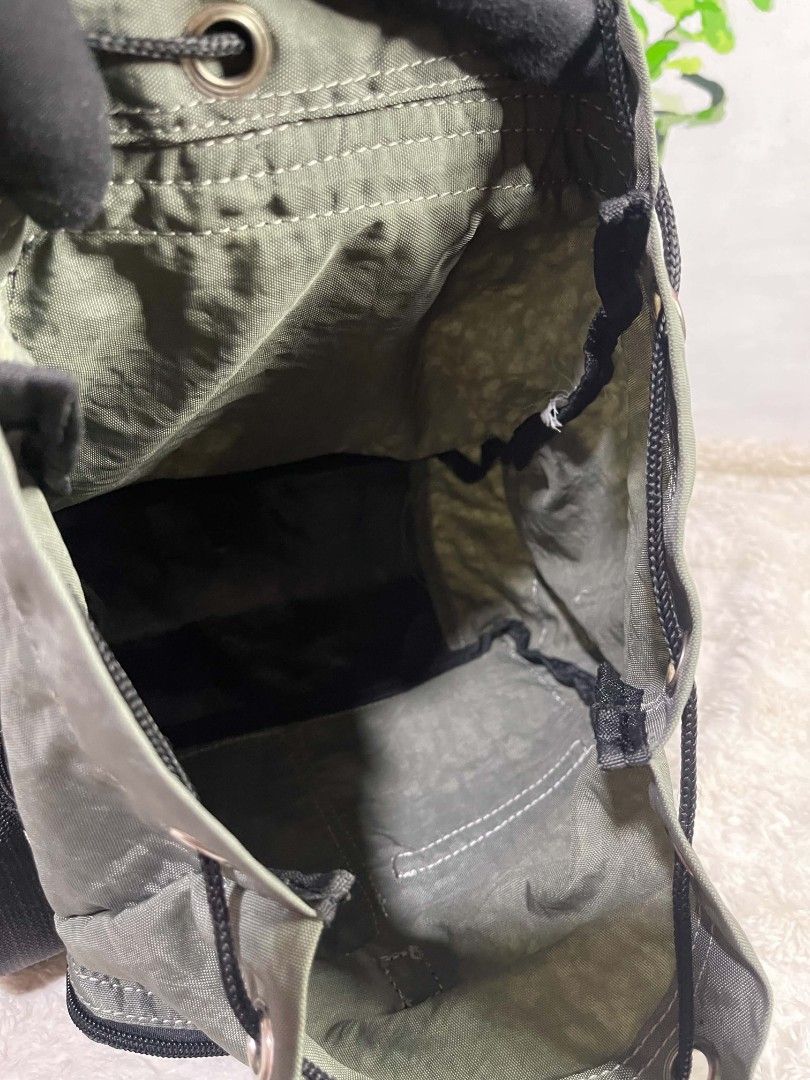 Etoile Paris France Olive Green Drawstring Backpack (Category: Backpacks) located in Naawan. Submitted by twilly.apparel2 (Listing ID 1464346849, Image 3). Description: - Brand: Etoile Paris France - Color: Olive Green - Style: Drawstring Backpack - Main compartment with inner pockets - Front flap pocket with buckle closure - Two side mesh pockets - Adjustable straps - Ideal for everyday use.