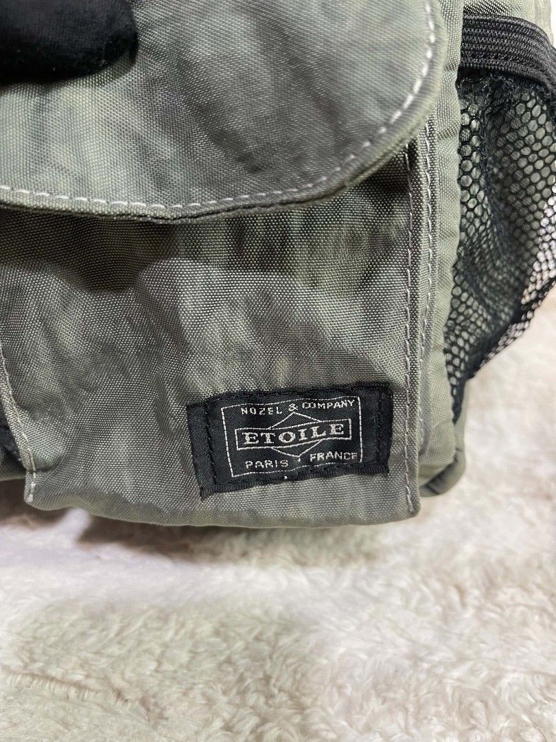 Etoile Paris France Olive Green Drawstring Backpack (Category: Backpacks) located in Naawan. Submitted by twilly.apparel2 (Listing ID 1464346849, Image 2). Description: - Brand: Etoile Paris France - Color: Olive Green - Style: Drawstring Backpack - Main compartment with inner pockets - Front flap pocket with buckle closure - Two side mesh pockets - Adjustable straps - Ideal for everyday use.