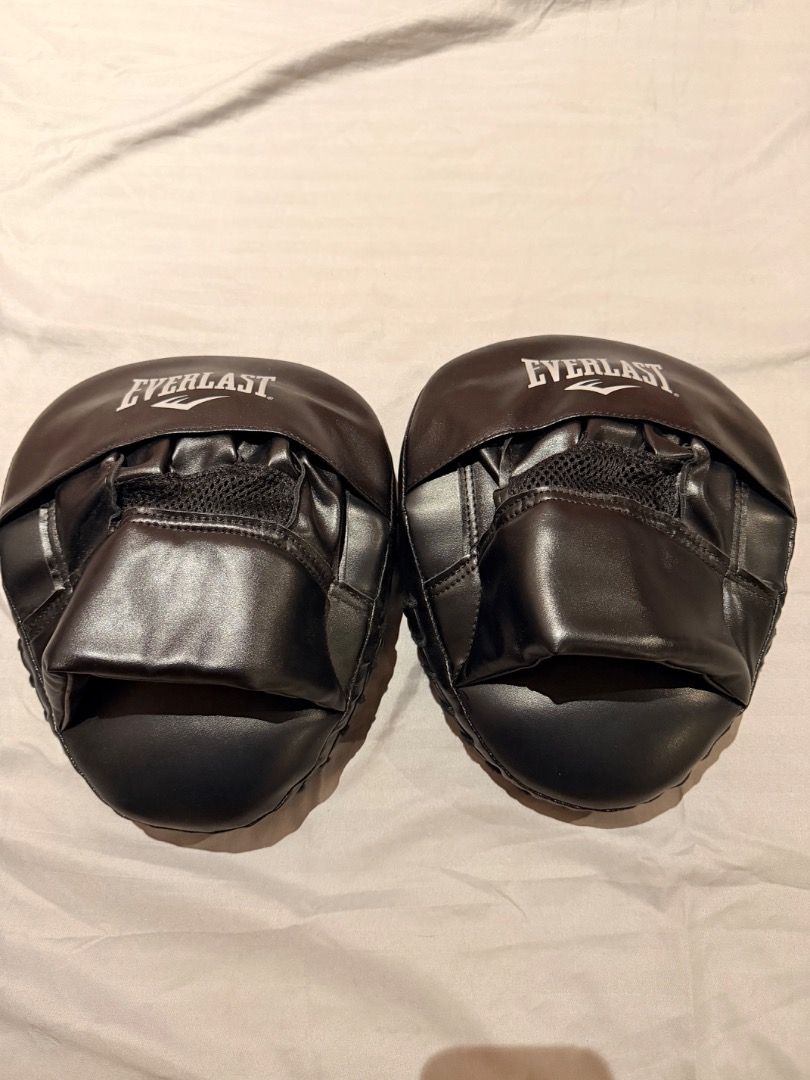 Everlast Impact Punch Mitts - One Size (Category: Combat Sports) located in Malabon City. Submitted by malou1219 (Listing ID 1464276985, Image 3). Description: - Everlast Impact Punch Mitts - One Size Fits All - Features Evercool Technology for breathability - Ideal for boxing, MMA, and other combat sports training - Comes in original, unopened packaging.