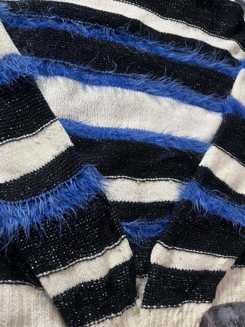 EVRIS Striped Fuzzy Knit Sweater (Category: Coats, Jackets and Outerwear) located in General Trias. Submitted by kevinthriftshop (Listing ID 1464279518, Image 2). Description: - Black, white, and blue striped knit sweater - Fuzzy blue accents on sleeves and body - Sparkly threads woven into black stripes - Crew neck, long sleeves - Super cozy and unique design - Ideal for layering or wearing solo.