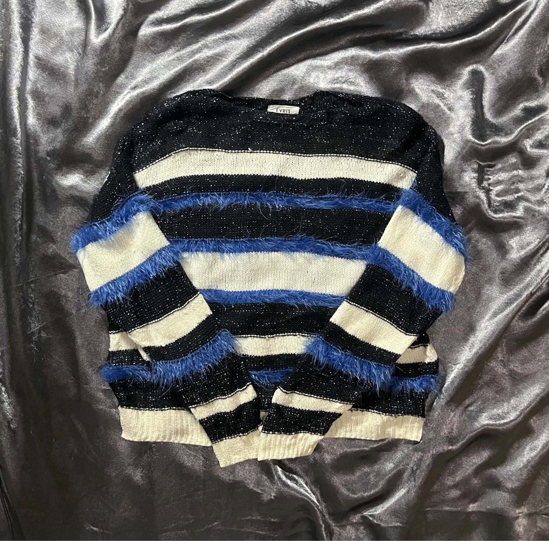 EVRIS Striped Fuzzy Knit Sweater (Category: Coats, Jackets and Outerwear) located in General Trias. Submitted by kevinthriftshop (Listing ID 1464279518, Image 1). Description: - Black, white, and blue striped knit sweater - Fuzzy blue accents on sleeves and body - Sparkly threads woven into black stripes - Crew neck, long sleeves - Super cozy and unique design - Ideal for layering or wearing solo.