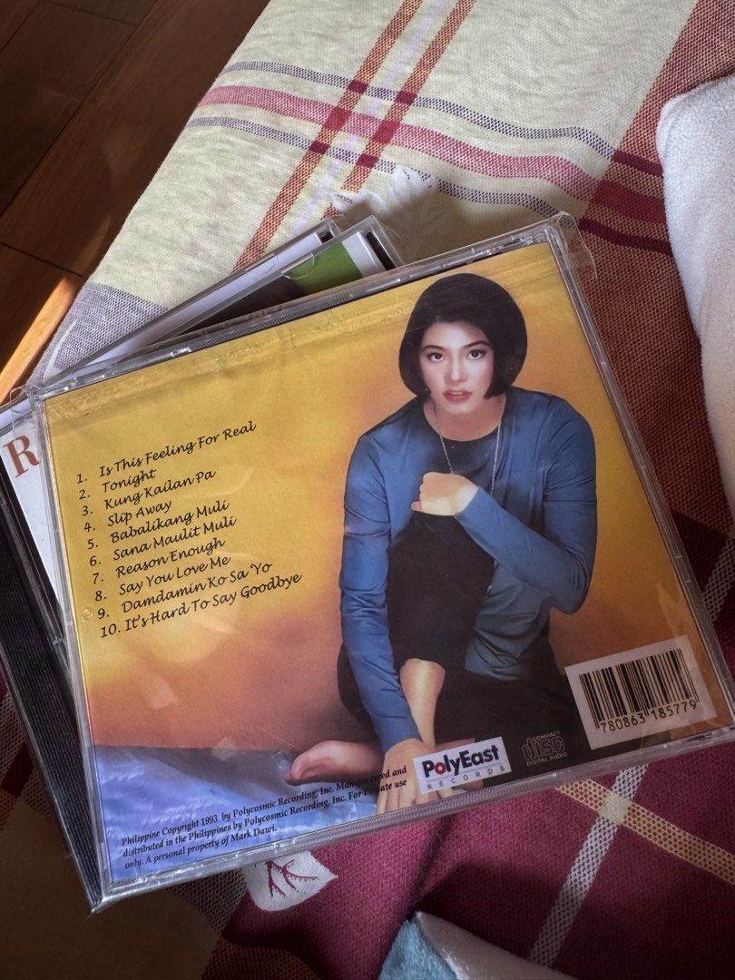 Fan Made Regine Velasquez Reason Enough CD (Category: CDs & DVDs) located in Manila. Submitted by markdarwin18477 (Listing ID 1464137928, Image 2). Description: - Original CD of Regine Velasquez's 1993 album 'Reason Enough'. - Features 10 tracks, including hits like 'Is This Feeling For Real', 'Kung Kaibigan Pa', and the title track 'Reason Enough'. - Released by PolyEast Records. - A must-have for collectors and fans of classic OPM music..