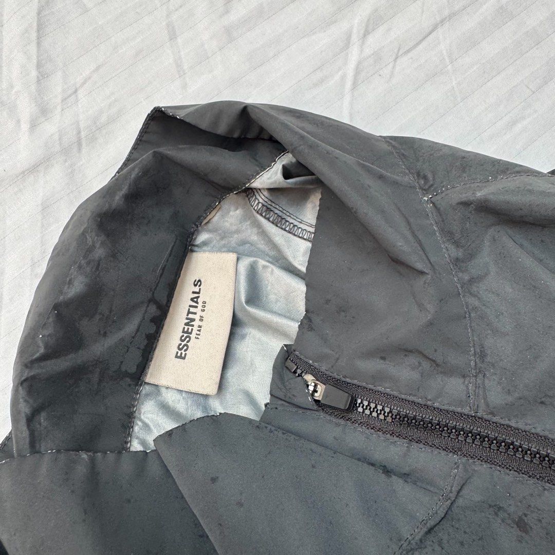 Fear of God Essentials Pullover Anorak Jacket (Category: Coats, Jackets and Outerwear) located in Manila. Submitted by safeowl.b6dbb0 (Listing ID 1464199499, Image 2). Description: - Grey Fear of God Essentials anorak jacket - Features a half-zip closure - Convenient front pouch pocket - Adjustable drawstring hem - Ideal for layering Sign of usage Legit/Authentic Loc pasig.