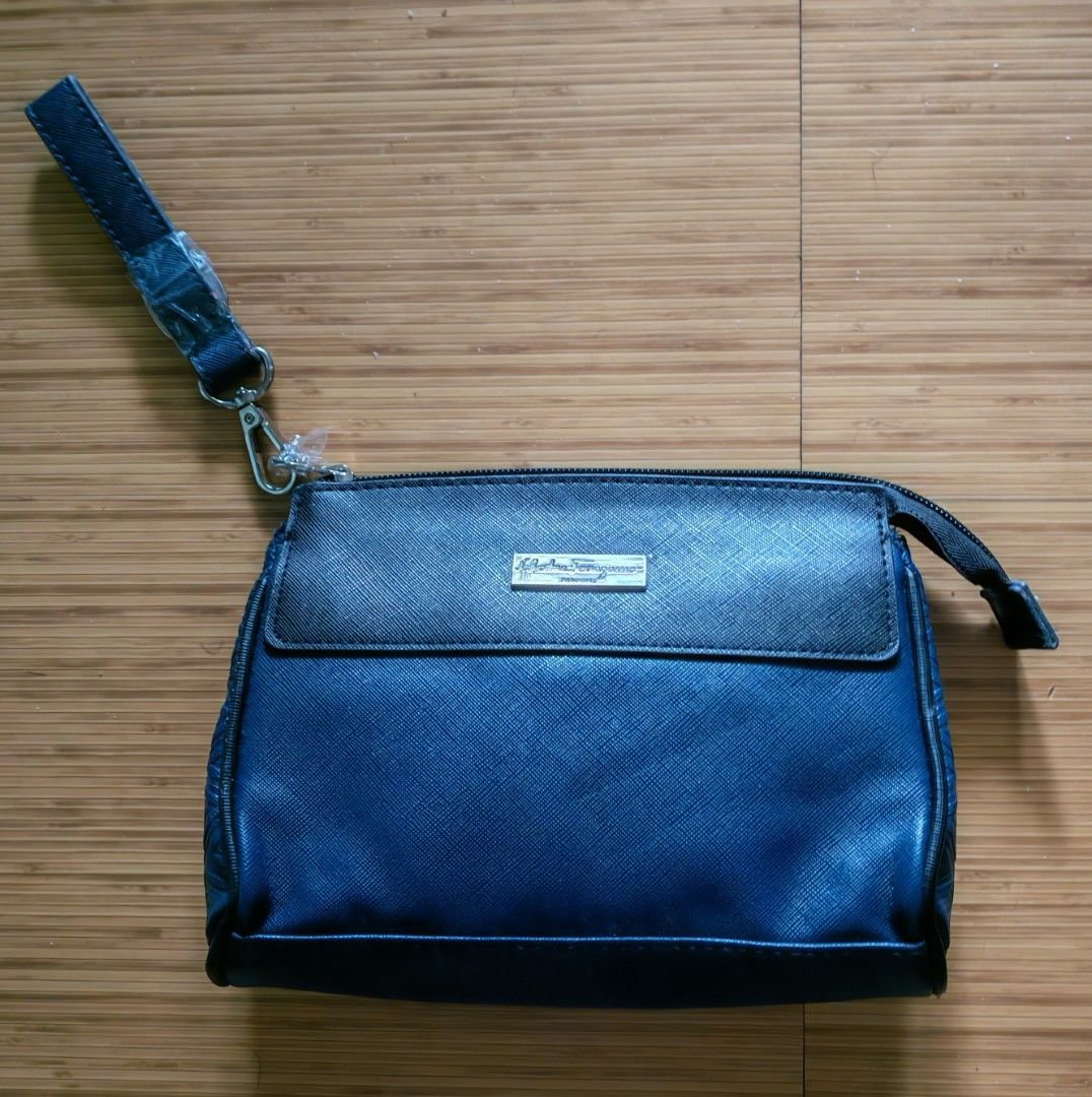 Ferragamo Saffiano Leather Pouch Wristlet (Category: Luxury Bags & Wallets) located in Davao. Submitted by athenaprelovedph (Listing ID 1464221416, Image 1). Description: Brand new condition, authentic wristlet pouch Saffiano leather .