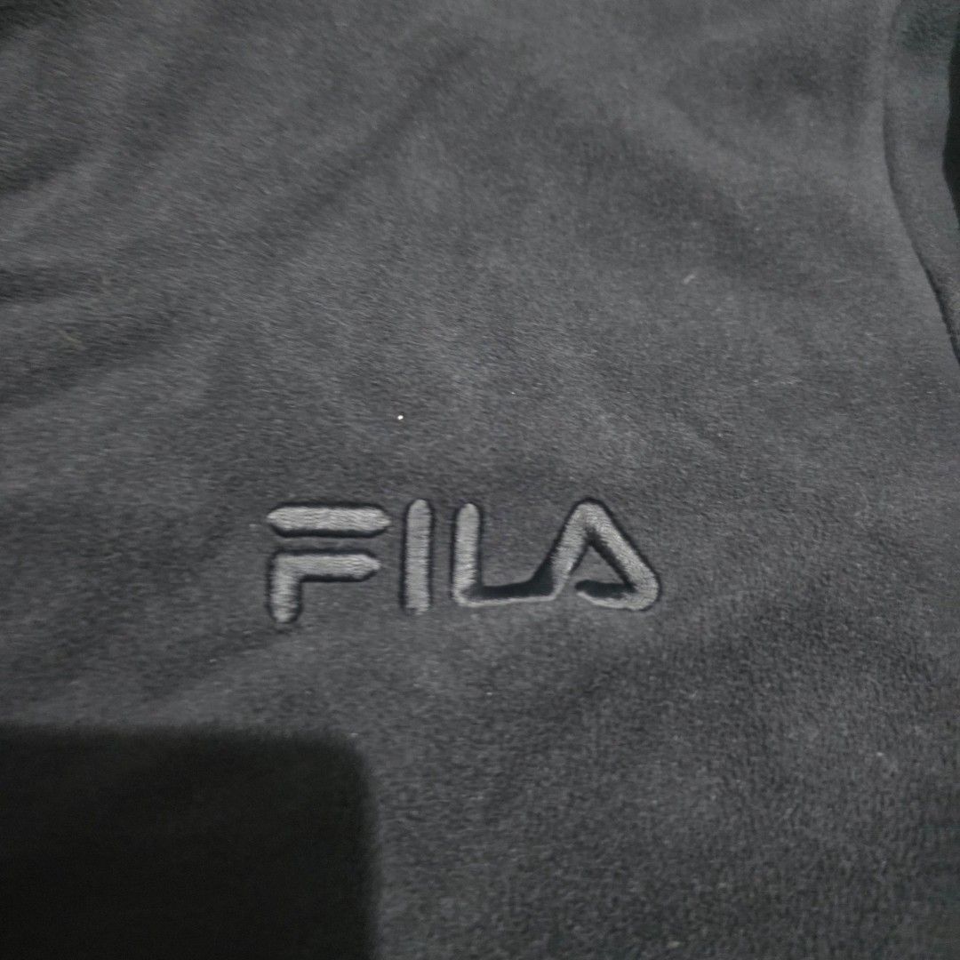 Fila White Line Fleece Zip-Up Jacket (Category: Coats, Jackets and Outerwear) located in Quezon City. Submitted by kick_mnl (Listing ID 1464167122, Image 2). Description: - Classic Fila fleece jacket - Full zip-up front with stand-up collar - Comfortable and simple design - Ideal for layering - Embroidered Fila logo on chest - Small Fila logo detail on zipper pull - Perfect for casual wear.