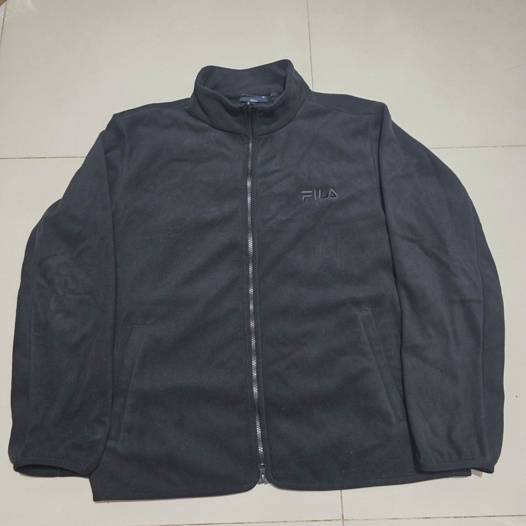 Fila White Line Fleece Zip-Up Jacket (Category: Coats, Jackets and Outerwear) located in Quezon City. Submitted by kick_mnl (Listing ID 1464167122, Image 1). Description: - Classic Fila fleece jacket - Full zip-up front with stand-up collar - Comfortable and simple design - Ideal for layering - Embroidered Fila logo on chest - Small Fila logo detail on zipper pull - Perfect for casual wear.