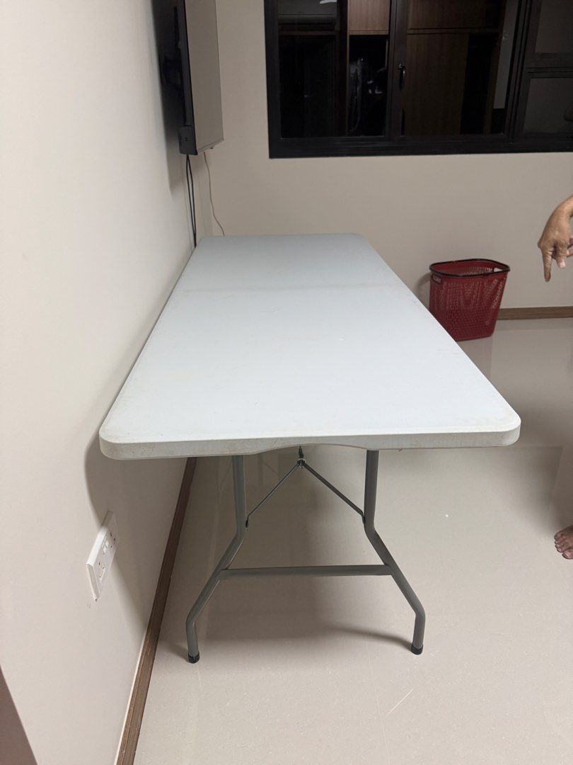 Foldable table (Category: Tables & Sets) located in Singapore. Submitted by ashll (Listing ID 1464188243, Image 3). Description: Foldable and portable table. Dimension (L) 180cm x 74cm Ideal for parties, event or extra table for work Space saving when not in use Moving house and have to let go. Self collect at Bukit Batok area Interested please pm me. .