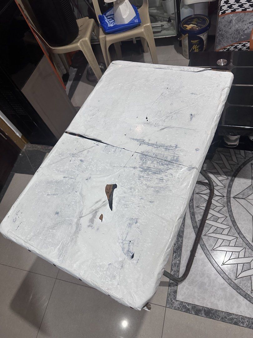 Folding Table White Top Metal Legs (Category: Tables & Sets) located in Manila. Submitted by zuripot0726 (Listing ID 1464256919, Image 2). Description: - Portable folding table - Top is made of fiberboard - Metal folding legs - Provides extra surface space - Folds flat for easy storage - Sturdy construction - dimensions: 31in x 19in x 0.75in ⚠️ Shows some signs of wear on top and rust on legs.