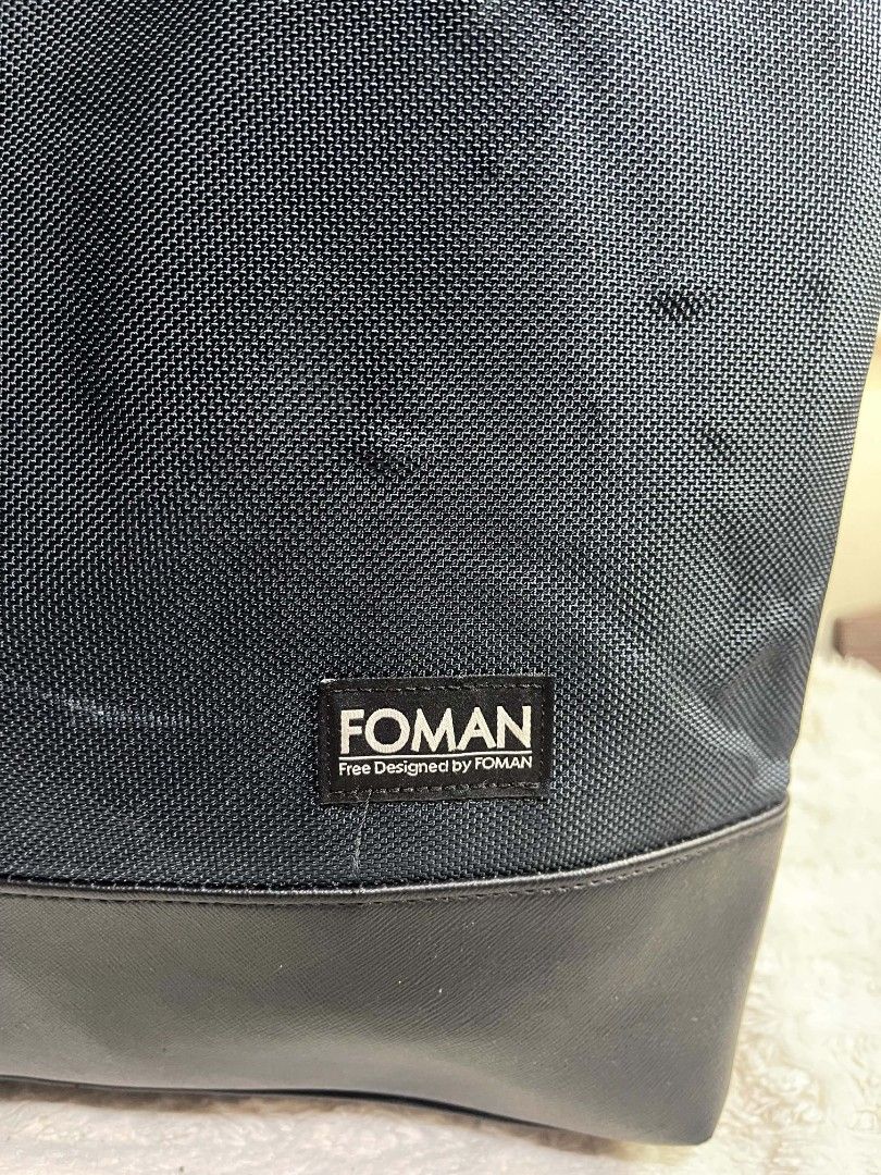 Foman Tote Bag Blue (Category: Tote Bags) located in Naawan. Submitted by twilly.apparel2 (Listing ID 1464345697, Image 3). Description: -bubbles sa body, may issue sa edge Stylish black Foman tote bag - Textured weave fabric - Faux leather base - Mixed fabric and faux leather handles - Minor scuffs on faux leather trim (please check photos for details).