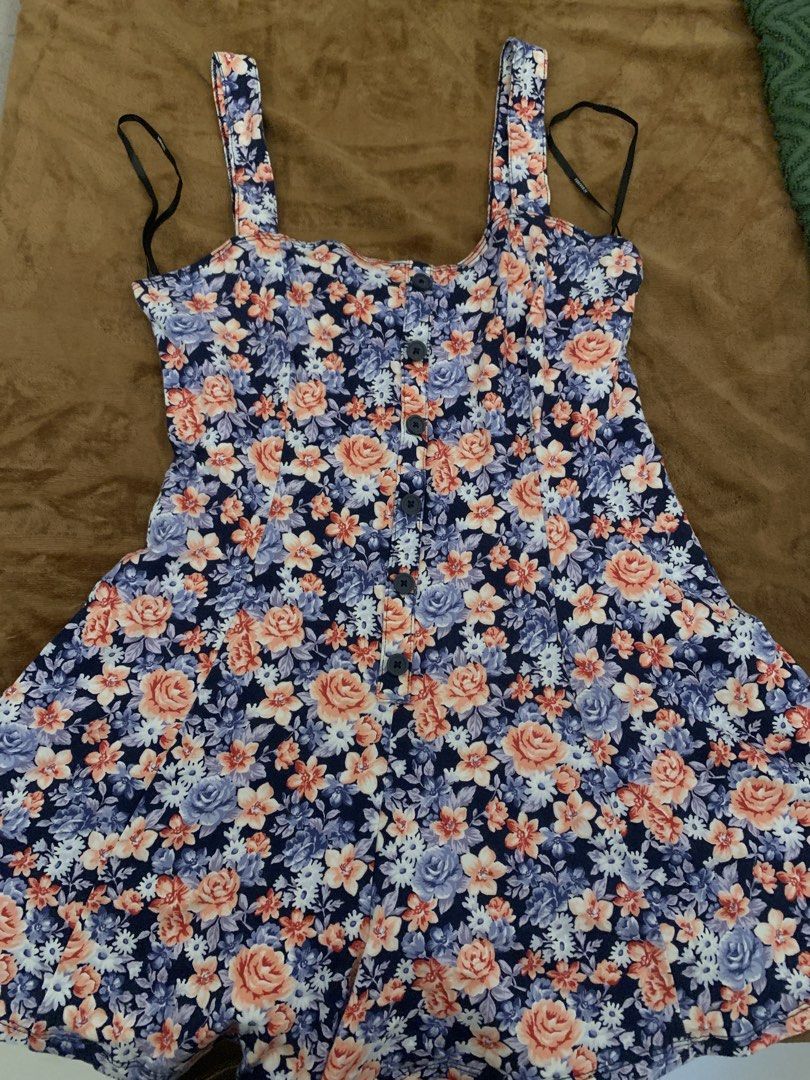 Forever 21 Floral Mini Dress (Category: Blouses) located in Manila. Submitted by itz_geelllyyy (Listing ID 1464172545, Image 1). Description: - Navy blue top with a vibrant floral print (pink, orange, purple flowers) - Short sleeves - Made in Vietnam - Size S - Ideal for casual outings.