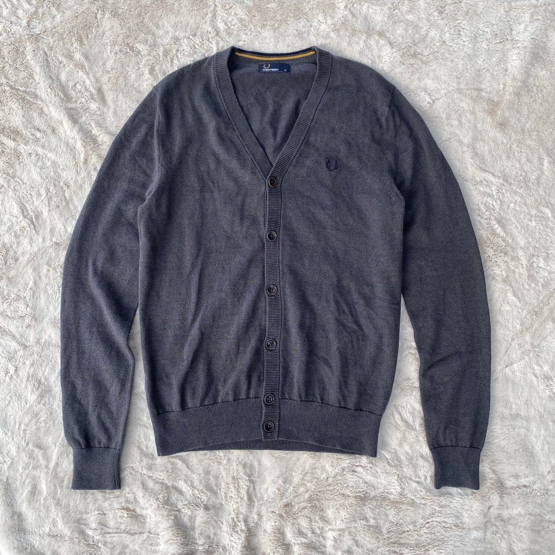 FRED PERRY KNITTED CARDIGAN LONG SLEEVE AUTHENTIC (Category: Coats, Jackets and Outerwear) located in Cadiz. Submitted by thrift_hunt_garage (Listing ID 1464253123, Image 1). Description: FRED PERRY KNITTED CARDIGAN LONG SLEEVE AUTHENTIC Size and measurements by inches : On tag Medium Width 20 Length 28 Sleeve 28 Conditions and details : Knitted material 6 button cardigan With Fred Perry engrave in button Issue none Flaws none.