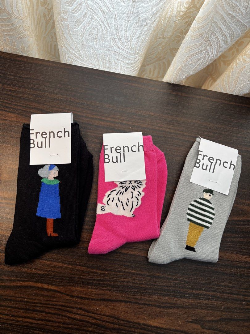 French Bull Socks - Cute Character Designs (Category: Socks & Tights) located in Makati City. Submitted by ciriacoria (Listing ID 1464184343, Image 1). Description: - Set of 5 French Bull socks - Features fun character designs: person in blue coat, fluffy dog, person in striped shirt, person in red dress, and a bird - Adds personality to any outfit - Soft and comfortable material.