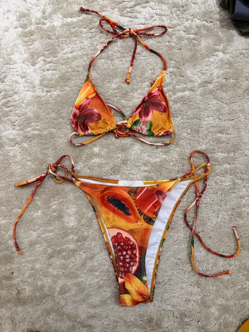 Fruit Print Halter Neck Bikini Set (Category: Bikinis & Swimsuits) located in Caloocan City. Submitted by croissant8765 (Listing ID 1464312155, Image 2). Description: - Adorable fruit print bikini - Halter neck top with adjustable tie closures - Matching bottoms with adjustable tie sides - Vibrant, fun tropical pattern - Ideal for beach vacations and pool days.