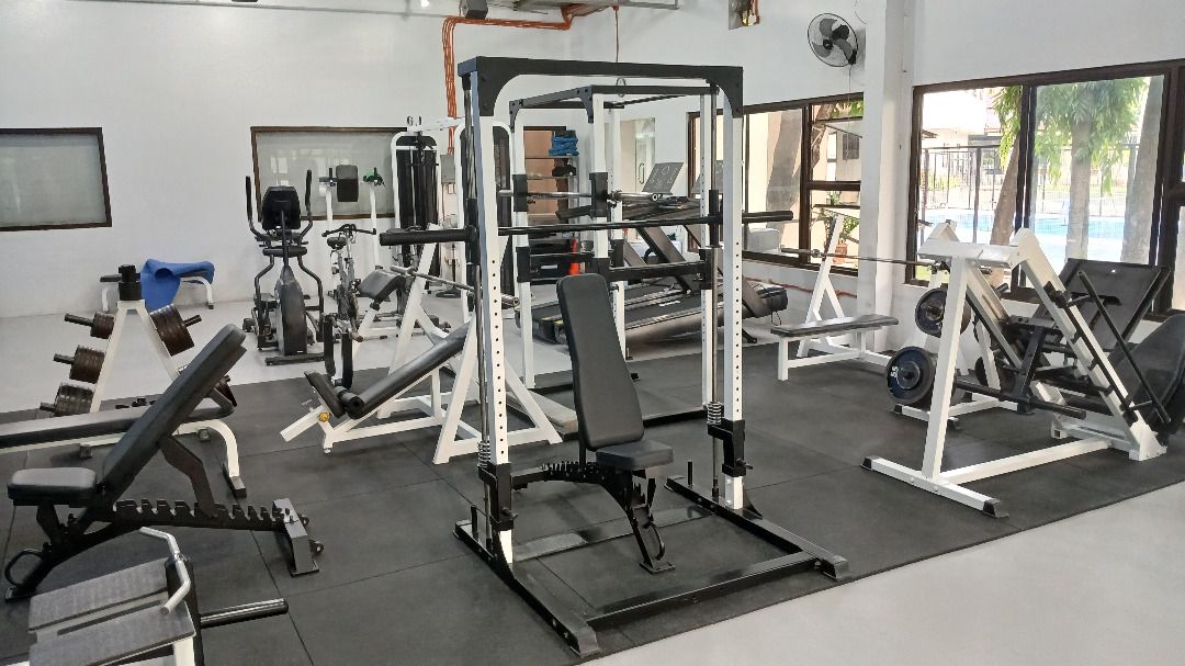 Full Gym Setup - Treadmills, Smith Machine, Multi-Gym (Category: Cardio & Fitness Machines) located in Muntinlupa City. Submitted by hidefhome (Listing ID 1464209869, Image 2). Description: P750,000 Package Price ONLY Selectorized Machines 1. Leg Extension 2. Leg Curl 3. Lat Pulldown with Mid Row 4. Chest Press 5. Pec Dec 6. Shoulder Press 7. Ab Machine 8. Cable X-Over Free Weights 9. Smith Machine (Linear) 10. 45Deg Leg Press/Hack Squat 11. Powe