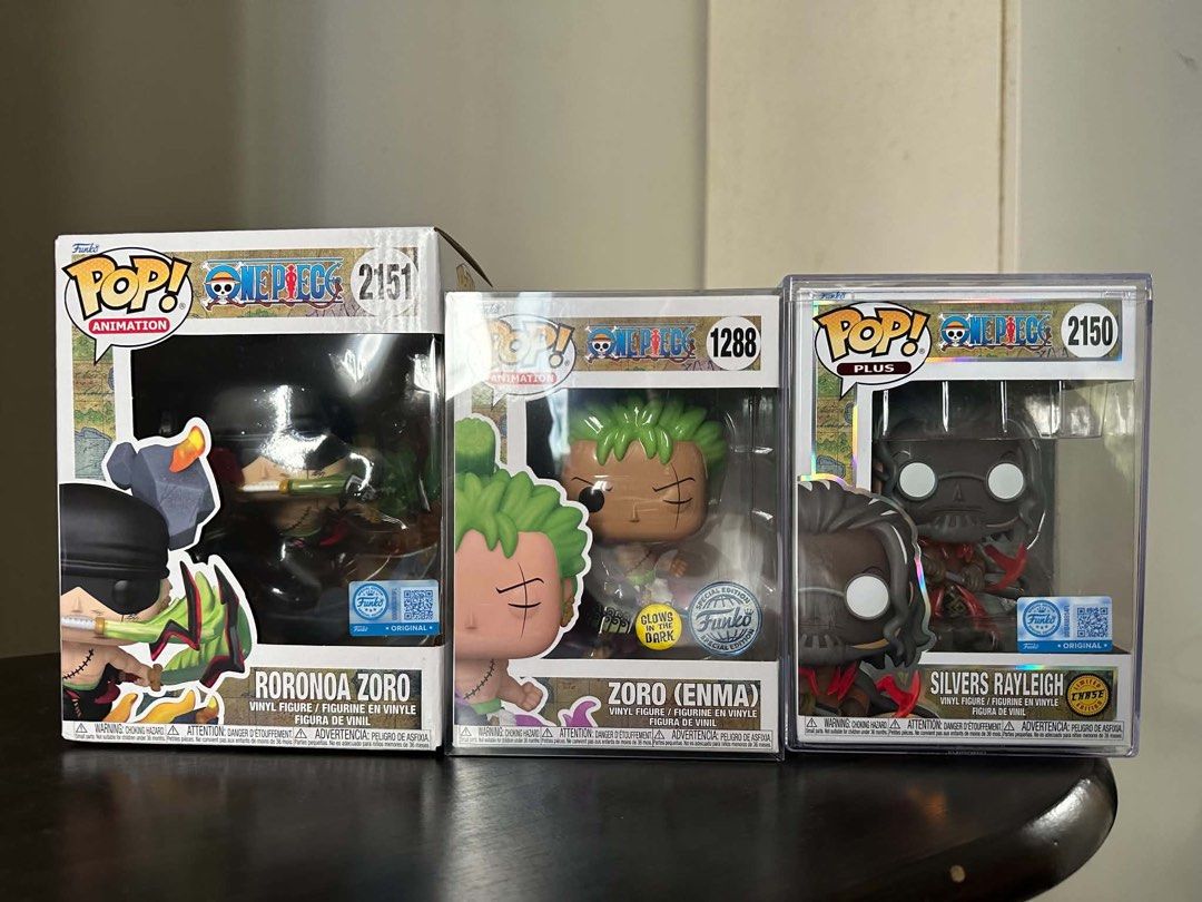 Funko pop one piece (Category: Figurines & Statues) located in Manila. Submitted by blueyyy13 (Listing ID 1464170112, Image 1). Description: Zoro GITD - ₱1600 Zoro king of hell - ₱1800 Rayleigh chase - ₱3500 .