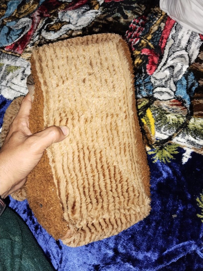 Fuzzy Plush Handbag / Back pack (Category: Cross-body Bags) located in Mabalacat. Submitted by al_amin_thrift (Listing ID 1464233356, Image 2). Description: 🧸 Fuzzy Plush Handbag / Backpack — Brown Cozy Style Item Details - Type: Soft plush/faux-fur bag — convertible design: top handles + adjustable shoulder/crossbody straps ​ - Colors: Warm chocolate brown front panel with lighter tiger-stripe textured tan sides, handles & top ​ - Material: Ult