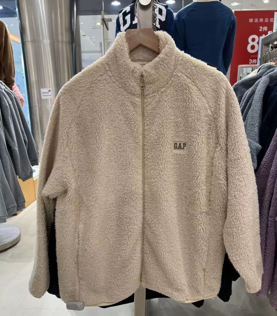 GAP Fleece Zip-Up Jacket Cream (Category: Coats, Jackets and Outerwear) located in Mandaluyong City. Submitted by kel_dypy (Listing ID 1464299662, Image 1). Description: - Cream colored fleece jacket from GAP - Full zip closure with stand-up collar - Soft and cozy material, ideal for cooler weather - Classic, easy-to-style design - Perfect for casual outings and layering with jeans or leggings GAP LOGO SHERPA FLEECE FULL ZIP JACKET bought this ar