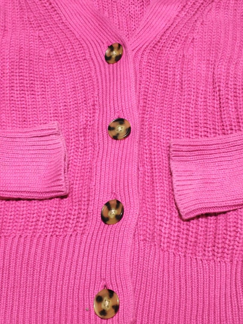 GAP Hot Pink Cardigan (Category: Coats, Jackets and Outerwear) located in Baguio. Submitted by oberdosed (Listing ID 1464348801, Image 2). Description: GAP Hot Pink Cardigan A vibrant statement piece guaranteed to brighten up any wardrobe. Measurements: Length: 25" | Width: 17.5" | Sleeves: 25".