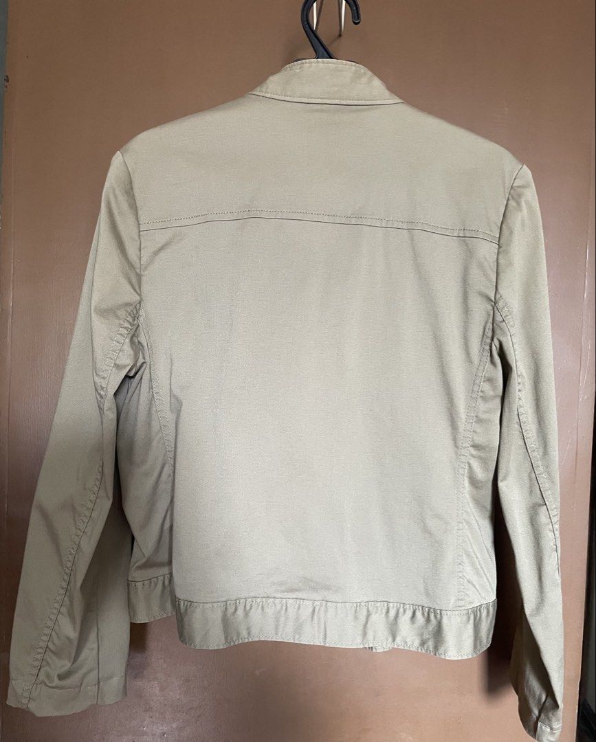 GAP Khaki Utility Jacket (Category: Coats, Jackets and Outerwear) located in Manila. Submitted by mochi_dear (Listing ID 1464164575, Image 3). Description: - GAP Khaki Utility Jacket - Button-up front - Two chest pockets - Mandarin collar style - Ideal for layering - Pairs well with jeans or casual pants - Great for everyday wear.