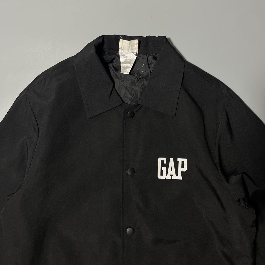 Gap Nylon Coach Jacket (Category: Coats, Jackets and Outerwear) located in Bacolod City. Submitted by marmanj (Listing ID 1464318716, Image 3). Description: ♻️ Gap Nylon Coach Jacket •Original - Complete tags •Condition: Excellent •Size: Large •Length:: 28” •Width 22” •Color: Black •Color rate: 9.5 / 10 •Design: Front and Back Gap Design •Needs wash only •No cracks on print - No major flaws 🔖Price: ₱680 📌Location: Bacolod City Negros Occidetal 