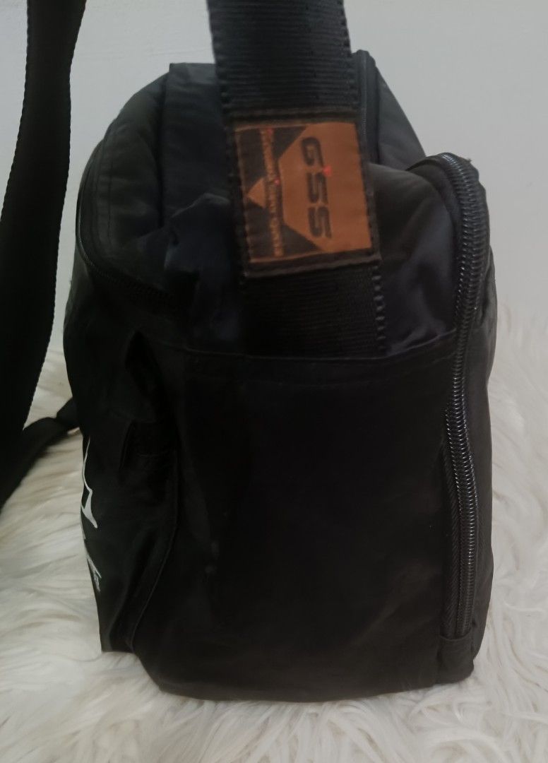 Genova Multi Compartment Nylon Bag (Category: Sling Bags) located in Davao. Submitted by naxarugal (Listing ID 1464163433, Image 2). Description: ukay source no issue size length 11.5 inches width 4.1 inches height 8 inches.